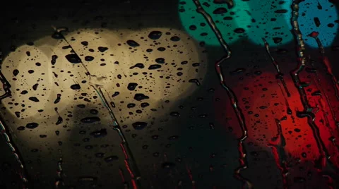 Traffic rain defocused headlights Stock Footage 44253106