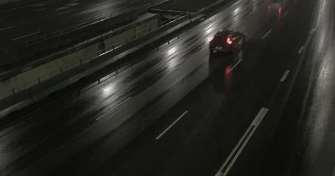 Traffic rain night Stock Footage 145872980