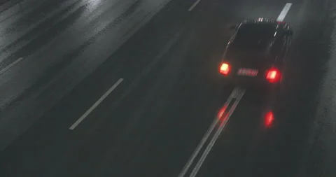 Traffic rain night Stock Footage 145873111