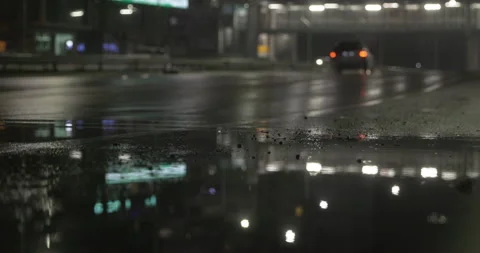 Traffic rain reflection at night Stock Footage 145792210