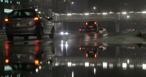 Traffic rain reflection at night Stock Footage 145792264