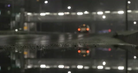 Traffic rain reflection at night Stock Footage 145792350