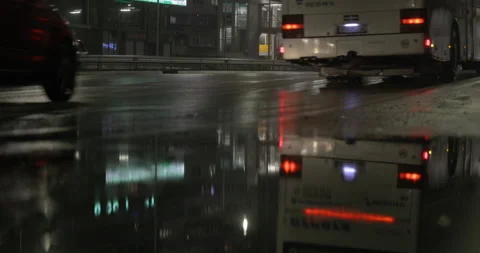 Traffic rain reflection at night Stock Footage 145792430