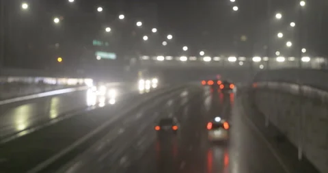 Traffic rain reflection at night Stock Footage 145793749