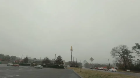 Traffic in the rain time-lapse early morning Stock Footage 147840653