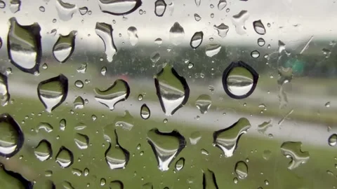 Traffic with raindrop  reflection n window in Austin, Tx 5/2/2026 Stock Footage 333915152