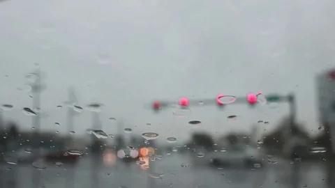 Traffic on rainy afternoon Stock Footage 81221682