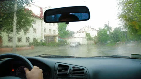 Traffic on a rainy day Stock Footage 26059841