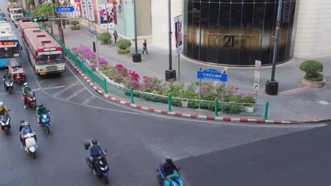Traffic at Ratchaprasong Intersection in Bangkok Stock Footage 148407675
