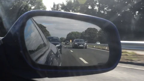 Traffic reflected in drivers wing mirror york uk Stock Footage 92848286