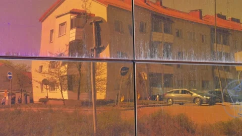 Traffic reflection in shiny building wall, Lappeenranta Finland Stock Footage 195658883