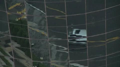 Traffic reflections in all-glass tower Stock Footage 37694200