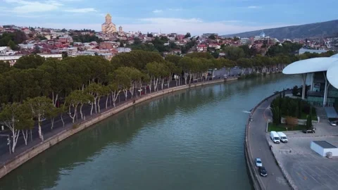 Traffic by the river in the evening Stock Footage 168565364