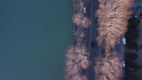 Traffic by the river in the evening Stock Footage 168577680