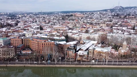 Traffic by the river in the winter Stock Footage 168624491