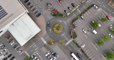 Traffic road and circular intersection between parking area Video stock 201422718