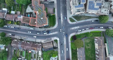 Traffic road and intersection point along apartment buildings Stock-Footage 201700799