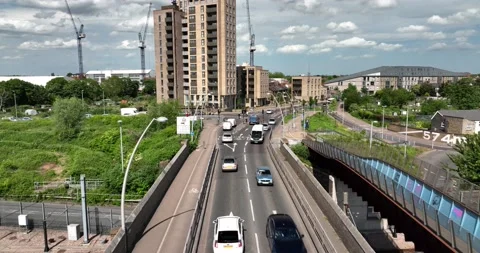 Traffic road bridge passes over railway track and building Video stock 201423646