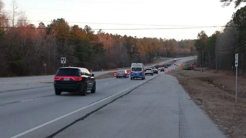 Traffic on a road construction highway with road work signs Stock Footage 147517971