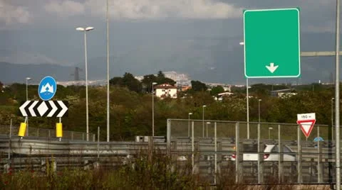 Traffic on the road with customizable road signs Stock Footage 10901575