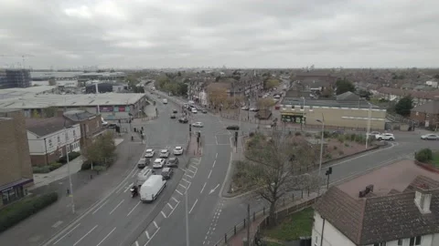 Traffic on road intersection in urban borough controlled by traffic lights Stock-Footage 167901981