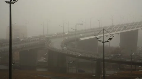 Traffic on the road junction in deep fog Stock Footage 49409482
