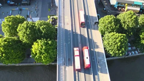 Traffic on road, red buses driving on bridge Stock-Footage 157461710