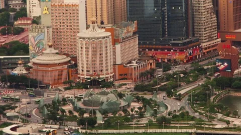 Traffic Roundabout in Macau with Casinos in Background at daytime Stock Footage 82876732