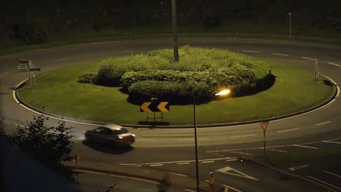 Traffic roundabout rotary night Stock Footage 72744264