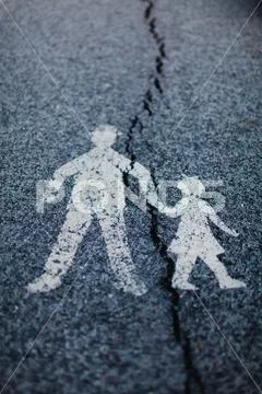 Traffic sign - crack divide relationship between parent and child. Stock Photos
