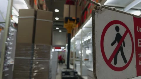 Traffic sign hanging in warehouse, rectangular Fixture with bold Font Stockbeeldmateriaal 272899171