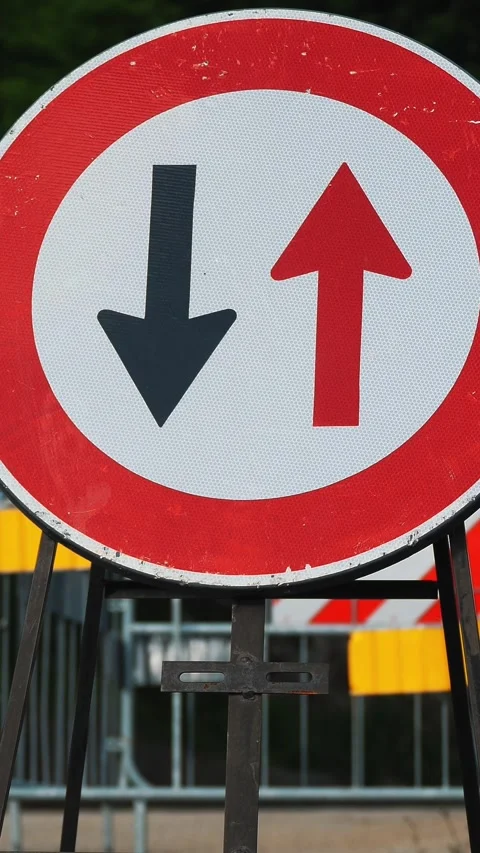 Traffic sign. Symbol. reverse movement. close-up. red and black arrows in a Stock Footage 310797023