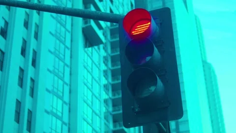Traffic signal light transitioning from red to green in city street Stock-Footage 341969403