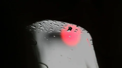 Traffic Signal through rainy window Stock Footage 73106202