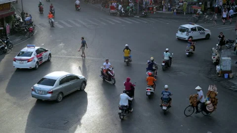 Traffic Slow Motion at Busy Intersection in the Old Quarter of Hanoi, Vietnam Stock Footage 218025808