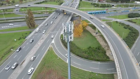 Traffic in slow motion on multilevel interstate overpass, all connected Stock Footage 144497936