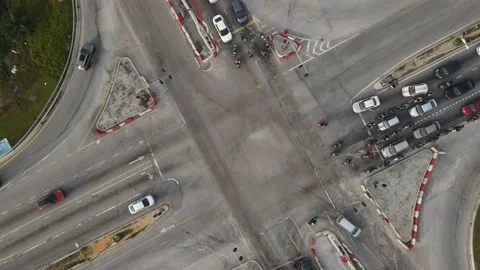 Traffic slow moving intersection junction peak hours in Puncak Alam, Selangor Stock Footage 230364115