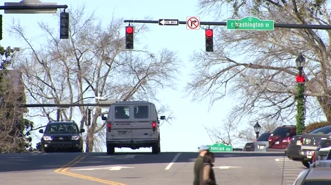 Traffic, Small City Stock Footage 1044360