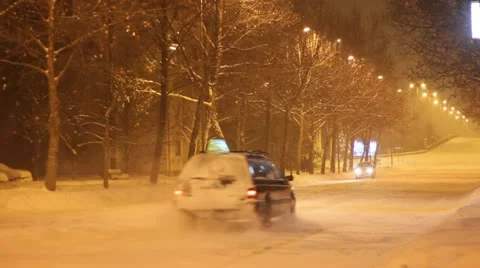 Traffic in a snow storm Stock Footage 11853424