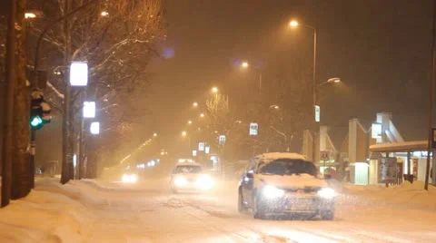 Traffic in a snow storm Stock Footage