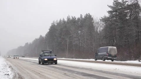 Traffic in the snow storm. Stock-Footage 98422572