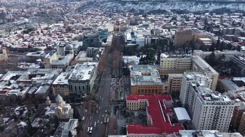 Traffic In The Snowy City Video stock 168963418