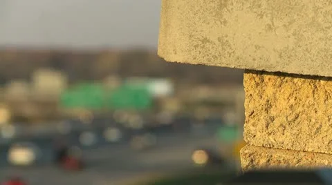 Traffic stone pillar rack focus Stock Footage 12687561
