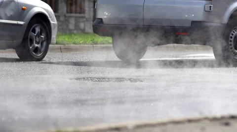 Traffic At A Stop Exhausting Gasses Stock Footage 50007640
