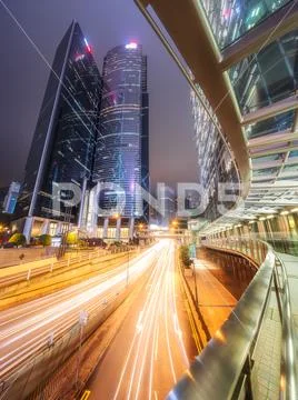 Traffic on streets of Hong Kong at night, China Stock Photos