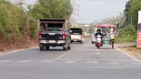 Traffic at a suburban intersection Stock Footage 240221766