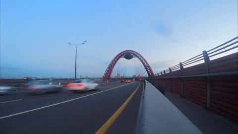 Traffic Through a Bridge in summer evening Timelapse Stock Footage 82044457