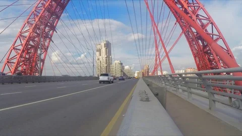 Traffic through cable-stayed bridge in summer day timelapse Stock Footage 79811322