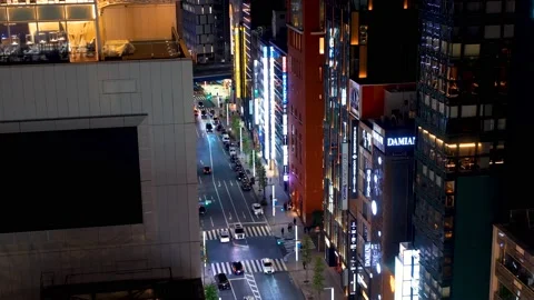 Traffic through Ginza retail district in Tokyo, Japan Stock Footage 234549945