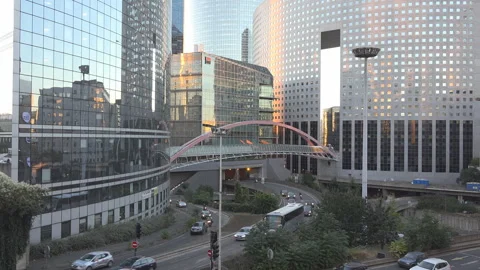 Traffic through the modern buildings in La Defense financial district of Paris Stock Footage 263992328